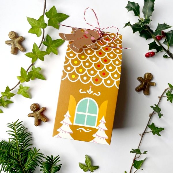 Gingerbread house packaging for Christmas treat duo candle and bath bomb